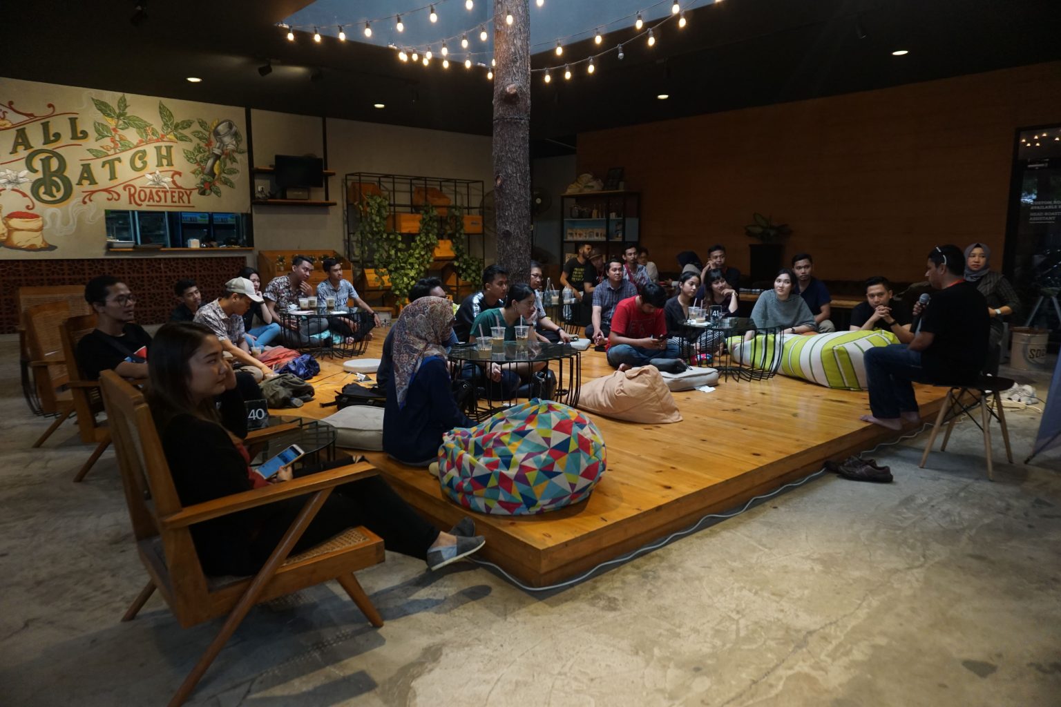 Participants listen attentively to the facilitator.