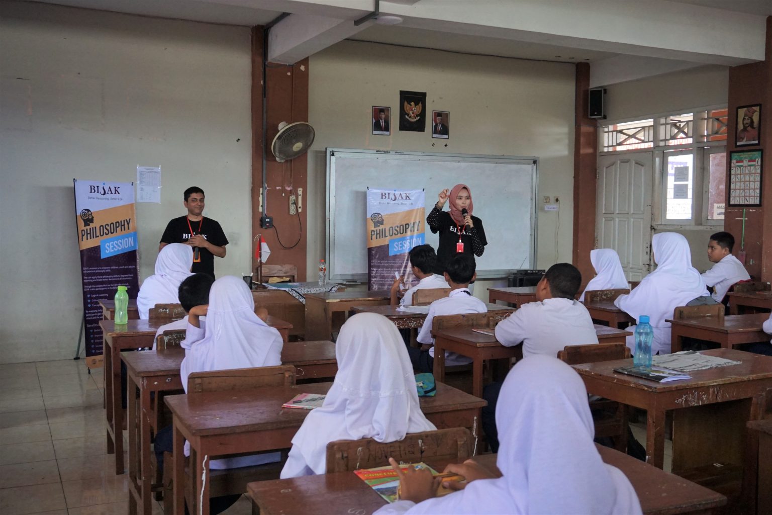 Dini tells the story of Two Friends and a Bear.