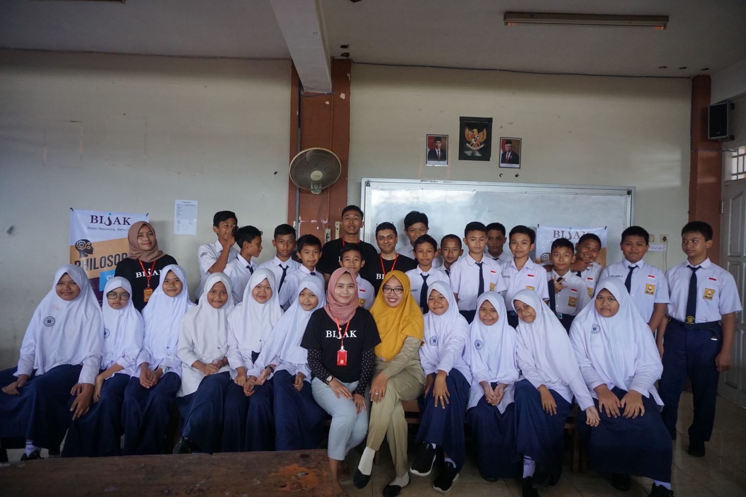 Participants pose for a group photo.